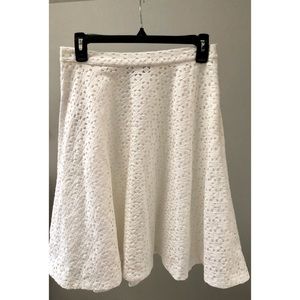 White circle skirt with lace-like details